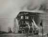 WINNIPEG FREE PRESS FILES
June 8, 1954. Caption found on back of photo: Dismorr Building on Portage Avenue immediately east of Time Building. This building gutted for complete loss. Norlyn Building north of Dismorr Building is just visible (with burning car beside it) through the smoke. Most of this building was destroyed.