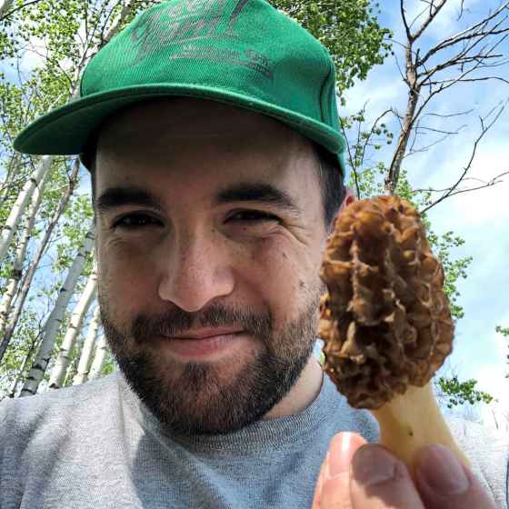 Reporter Ben Waldman holds a morel he found while foraging.