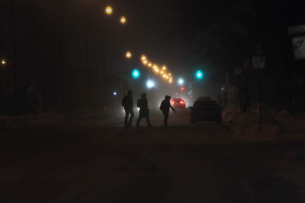 People head for the cars through the high north winds on William Avenue. January 11, 2013 (JOE BRYKSA / WINNIPEG FREE PRESS)