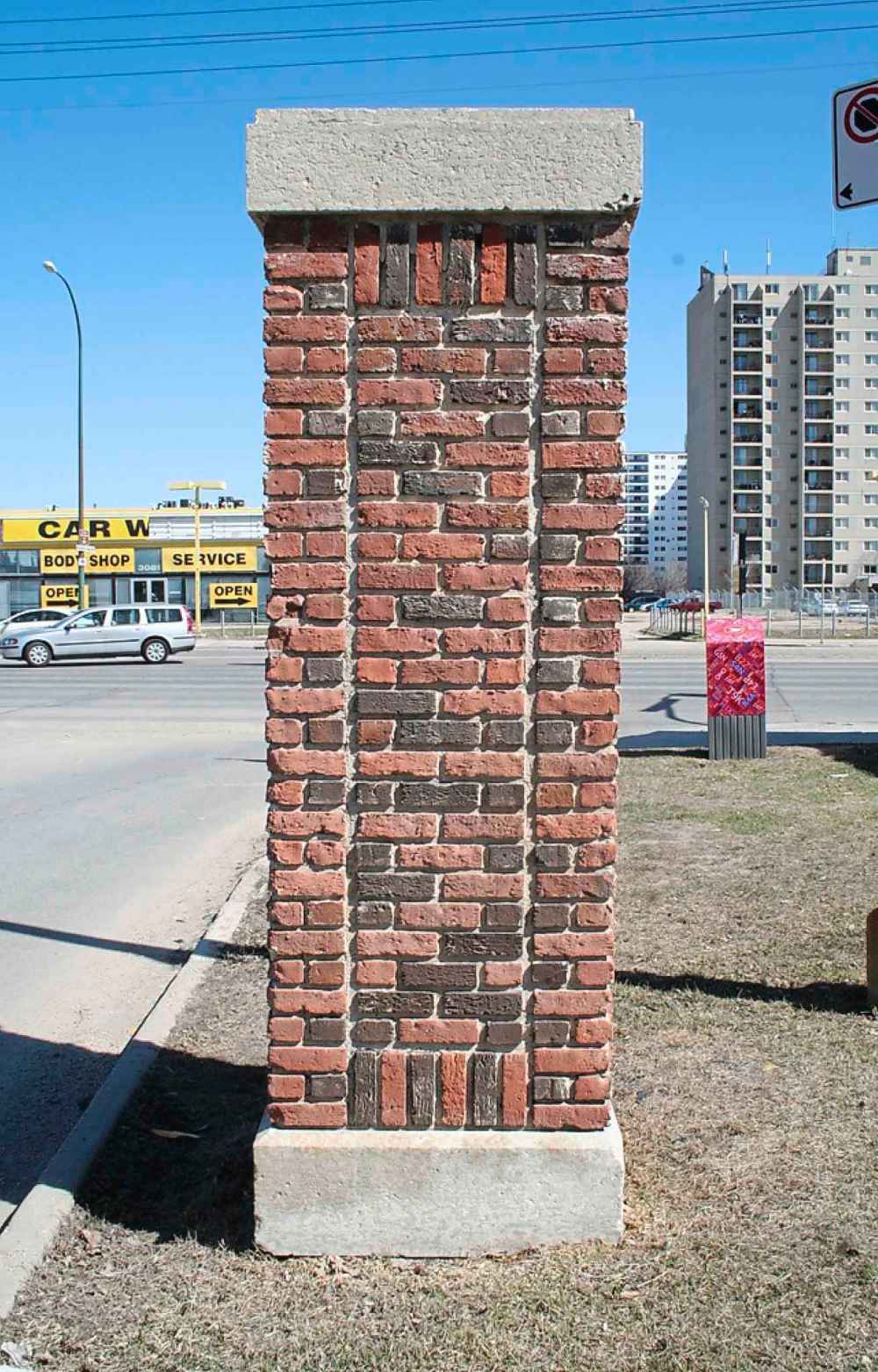 City of Winnipeg
Rejected: It's not known when a pair of street pillars at Country Club Boulevard and Portage Avenue were built; they originally included chains to close off road access to the St. Charles Country Club, which opened in 1904.  They were originally topped with wrought-iron electric lights, which were removed in the 1970s.  Only one of the pair remains; the other was demolished sometime after 1971, when the country club sold 22 hectares of land to a land developer for a residential neighbourhood, and the Portage Avenue entrance to the club was no longer relevant.  The club built a second entrance south of Meadowside Drive using the iron lights from these pillars.