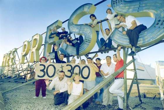 Crews don't get much motlier than this: staffers at the Winnipeg Free Press pose atop the newspaper's old building on Carlton Street in the early 1990s. (Winnipeg Free Press Archives)