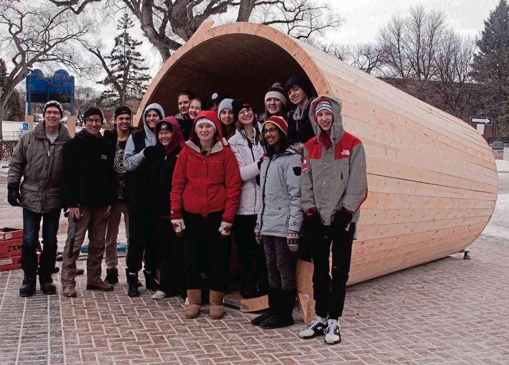 SHELDON BIRNIE/CANSTAR FILES A Grade 11 art class at Mennonite Brethren Collegiate Institute with the warming hut they designed.