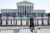 Security works outside of the Supreme Court, Thursday, June 30, 2022, in Washington. (AP Photo/Jacquelyn Martin)