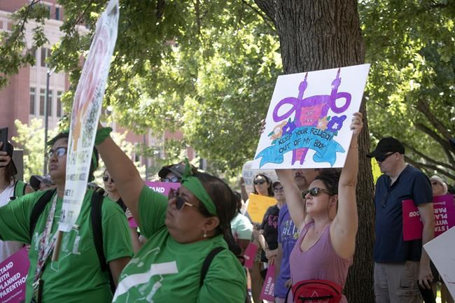 Abortion-rights advocates gather outside the Tarrant County Courthouse during the Bans Off Our Bodies protest in Fort Worth, Texas, on Saturday, June 25, 2022. Alternating between chants of