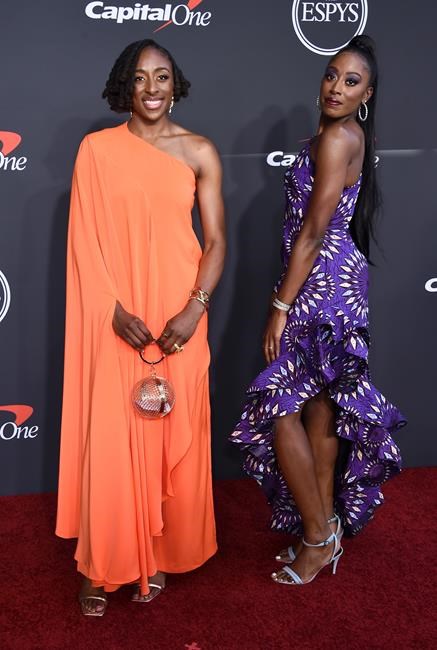 WNBA players Nneka Ogwumike left, and and Chiney Ogwumike of the Los Angeles Sparks arrive at the ESPY Awards on Wednesday, July 20, 2022, at the Dolby Theatre in Los Angeles. (Photo by Jordan Strauss/Invision/AP)