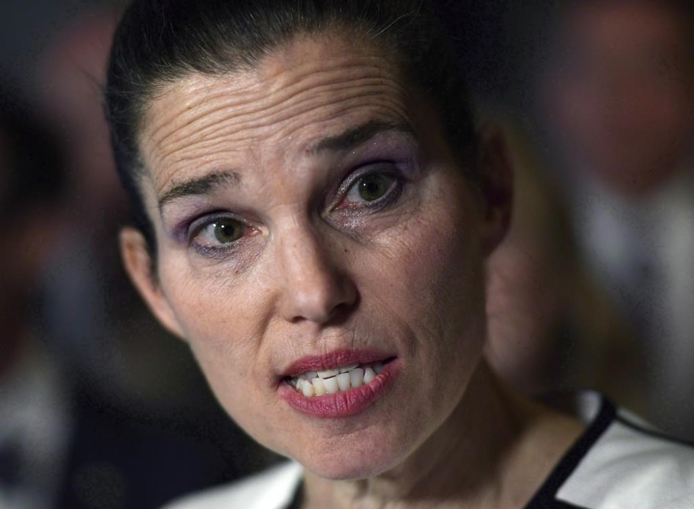 Former sport minister Kirsty Duncan speaks in the foyer of the House of Commons in Ottawa on June 19, 2018. Duncan, who was Canada's sport minister from 2015 to '19, is angry she wasn't informed by either Hockey Canada or Sport Canada about the assault allegations against the world junior team in 2018. THE CANADIAN PRESS/Justin Tang
