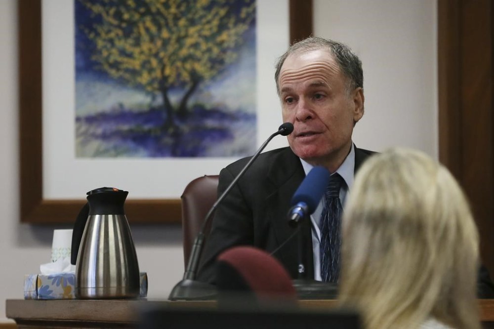 Roy Lubit, psychiatrist, explains at the Travis County Courthouse in Austin, Texas, Monday, Aug. 1, 2022, that Neil Heslin and Scarlett Lewis, parents of Sandy Hook shooting victim Jesse Lewis, have