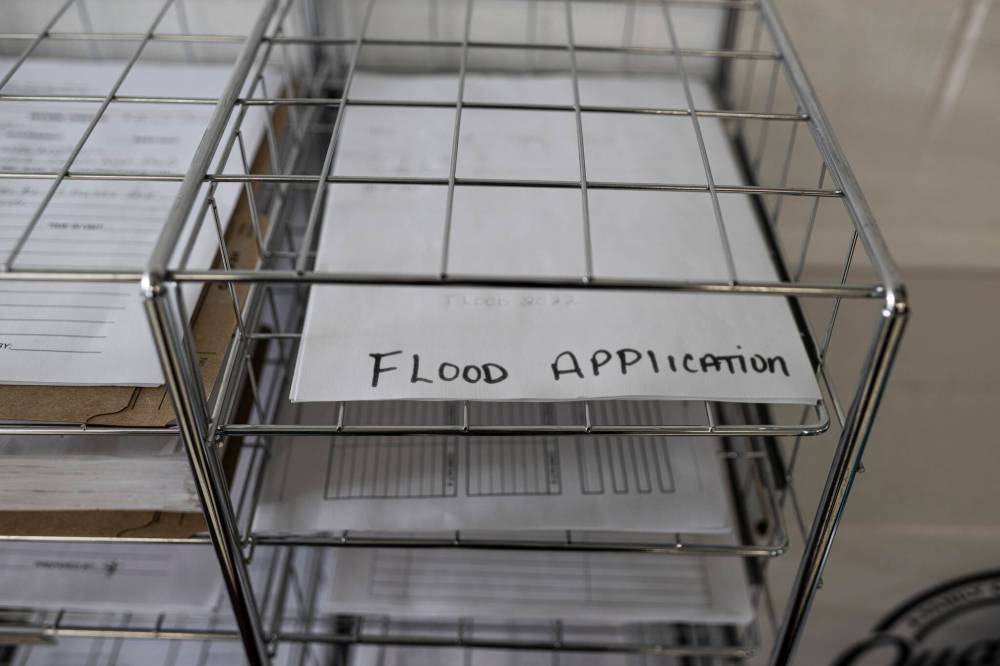 AARON VINCENT ELKAIM / THE NARWHAL
For Peguis residents, filing out flood-relief applications has become a semi-regular occurrence.