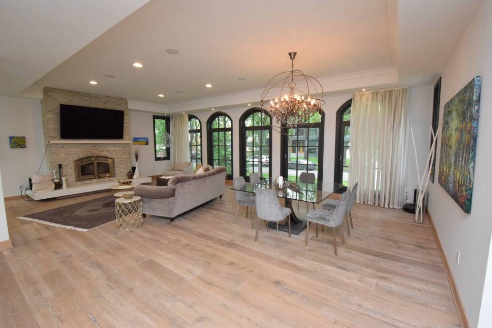 Defined by a stylish tray ceiling, the living room and dining area is both spectacular and highly functional.
