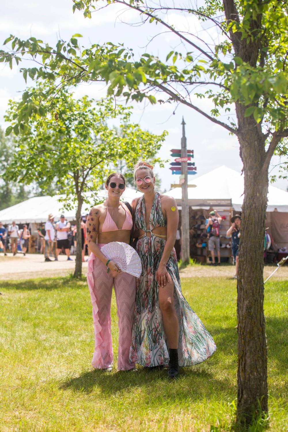 MIKAELA MACKENZIE / WINNIPEG FREE PRESS Crystal Kotelmach (left) and Breanne Sytnyk pose for a photo at the Winnipeg Folk Fest in Bird’s Hill Park on Friday, July 8, 2022. For Eva Wasney fashion story. Winnipeg Free Press 2022.