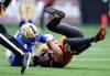 DARRYL DYCK / THE CANADIAN PRESS
B.C. Lions quarterback Nathan Rourke is sacked by Winnipeg Blue Bombers defensive end Willie Jefferson Saturday inn Vancouver. The Bombers gave the upstart Canadian and his teammates a healthy dose of comeuppance.