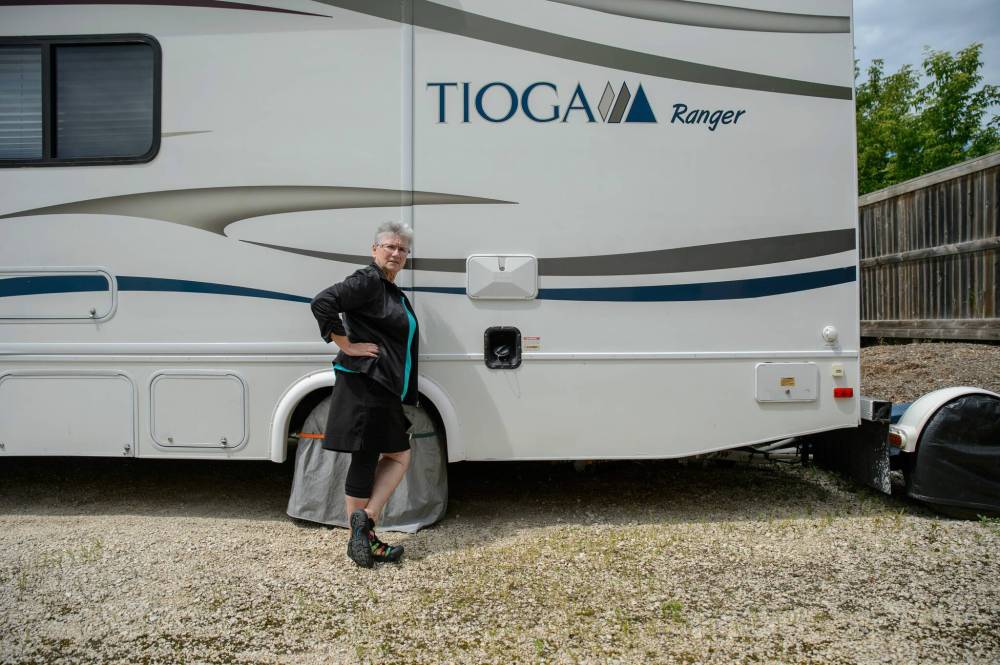ETHAN CAIRNS / WINNIPEG FREE PRESS
Mary Lou Milhausen next to her RV parked at a self-storage facility where she was the victim of gas theft leaving her RV stranded at the facility.