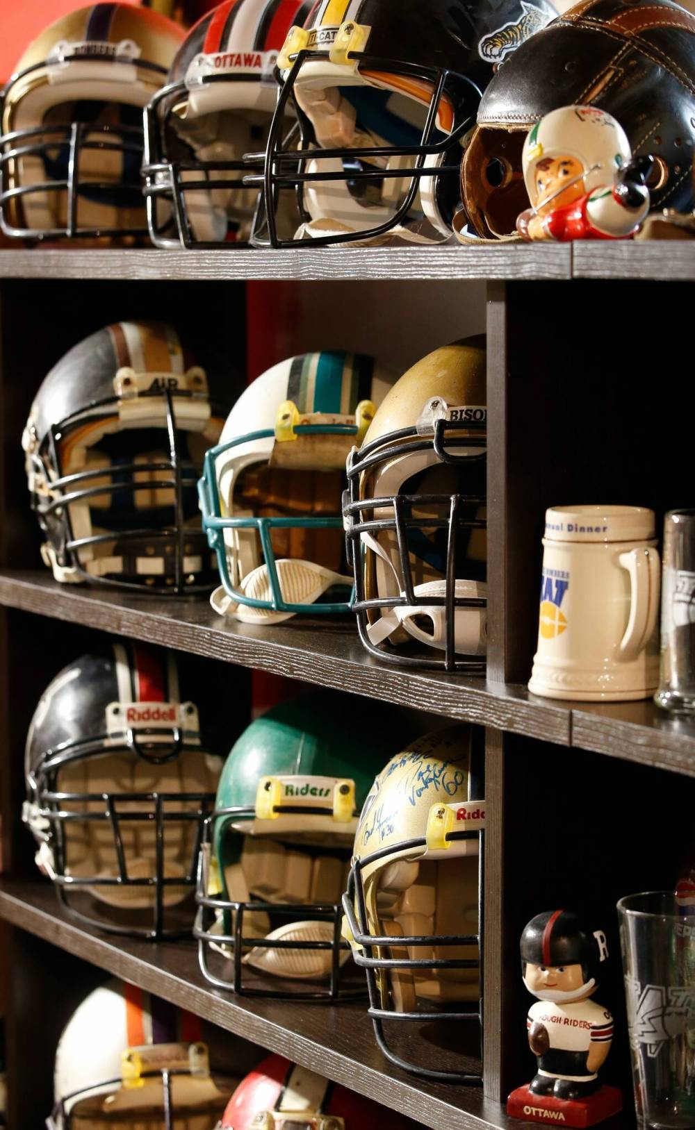 JOHN WOODS / WINNIPEG FREE PRESS
Helmets in Glen Ominski’s CFL memorabilia collection.