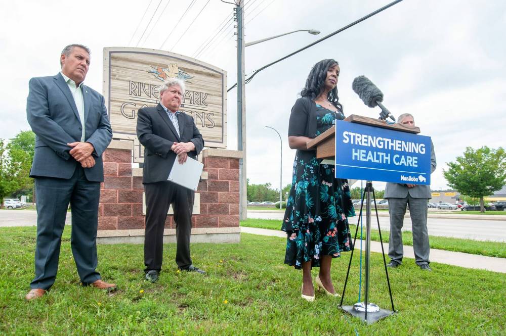 ETHAN CAIRNS / WINNIPEG FREE PRESSHeatlh Minister Audrey Gordon is flanked Tuesday by Minister of Economic Development, Investment and Trade Cliff Cullen (left) and Minister of Seniors and Long-Term Care Scott Johnston (centre).