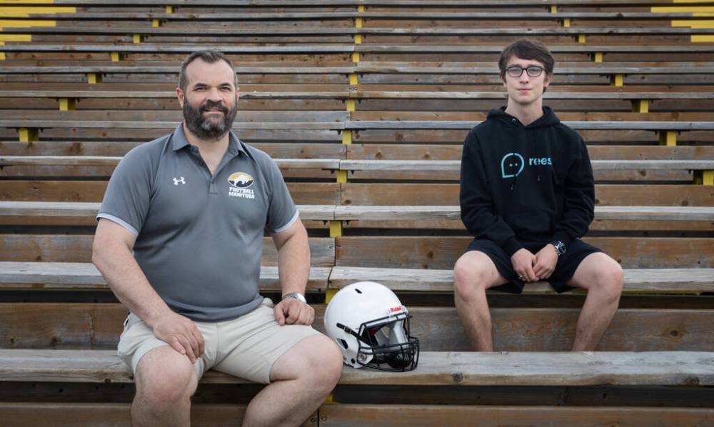 JESSICA LEE / WINNIPEG FREE PRESS
Football Manitoba executive director Bill Johnson (left) and Carter Dawson, partnership liaison of Respect, Educate, Empower Survivors (REES), at Charleswood Broncos Football Club.