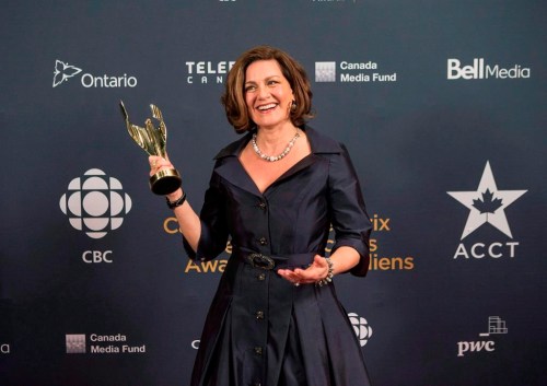 Lisa LaFlamme holds her award for best news anchor at the Canadian Screen Awards in Toronto on Sunday evening, March 1, 2015. Bell Media told staff in an internal memo that LaFlamme was given the opportunity to say farewell to viewers on CTV's nightly newscast. THE CANADIAN PRESS/Chris Young