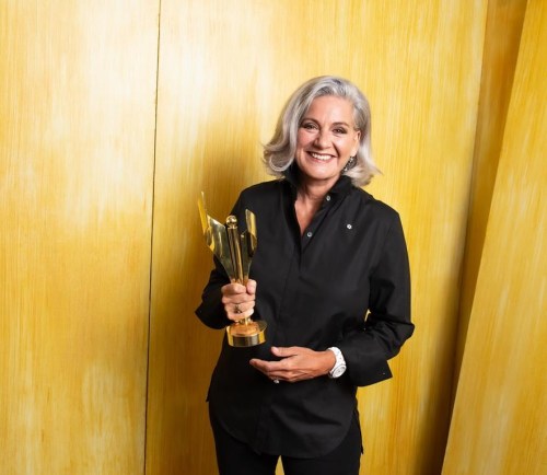 Lisa LaFlamme poses with her Canadian Screen Award for Best News Anchor, National in Toronto Wednesday, Aug. 17, 2022.&nbsp;The parent company of CTV News says it will launch an internal workplace review amid criticism of its dismissal of LaFlamme from her role as chief anchor.&nbsp; &nbsp;THE CANADIAN PRESS/HO-George Pimentel *MANDATORY CREDIT*