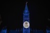 Parliament Hill is bathed in purple light and the Royal Cypher of Queen Elizabeth II is projected on the Peace Tower, following the death of Queen Elizabeth II, in Ottawa, on Thursday, Sept. 8, 2022. THE CANADIAN PRESS/Justin Tang