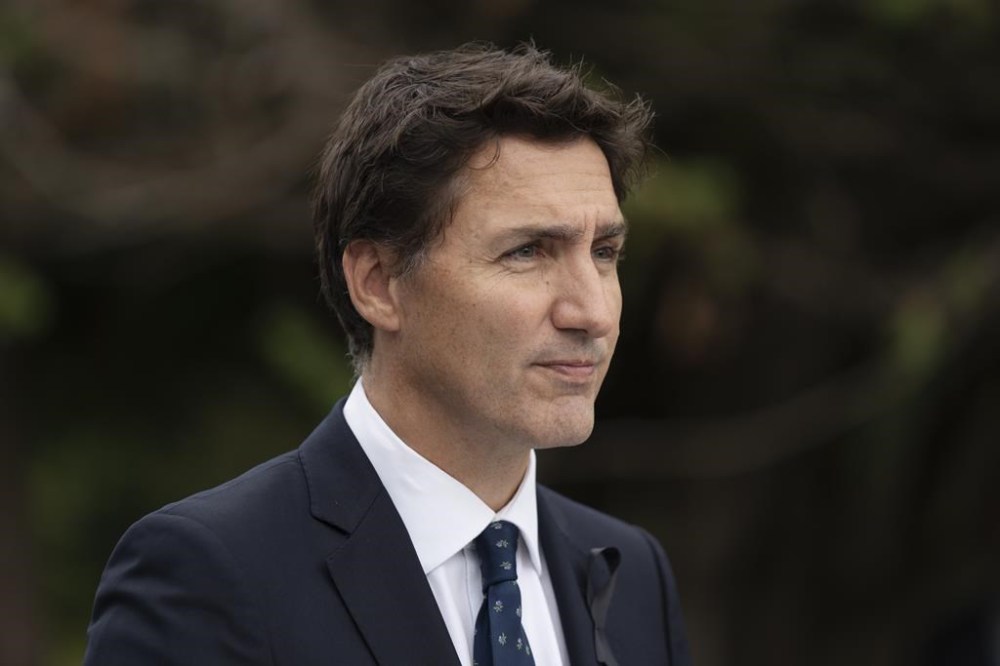 Prime Minister Justin Trudeau delivers a speech during the Liberal summer caucus retreat in St. Andrews, N.B., Monday, Sept. 12, 2022. Trudeau today will unveil the full details of a plan to try and take some of the sting out of inflation for Canadians feeling it the most. THE CANADIAN PRESS/Darren Calabrese