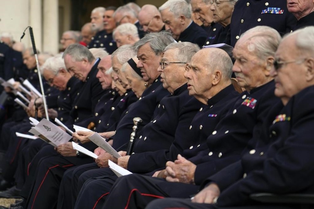Pensioners of the Royal Hospital Chelsea take part to a Drumhead Service of Remembrance for the late Britain's Queen Elizabeth II, in London, Tuesday, Sept. 13, 2022.(AP Photo/Alberto Pezzali)