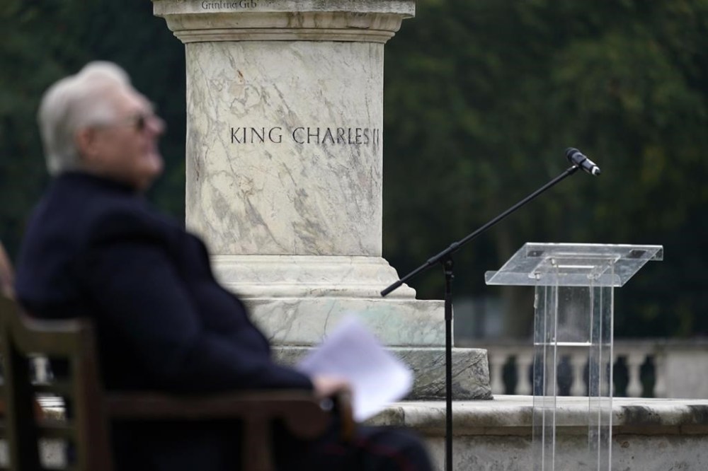 A pensioner of the Royal Hospital Chelsea sits prior to a Drumhead Service of Remembrance for the late Britain's Queen Elizabeth II, in London, Tuesday, Sept. 13, 2022. (AP Photo/Alberto Pezzali)
