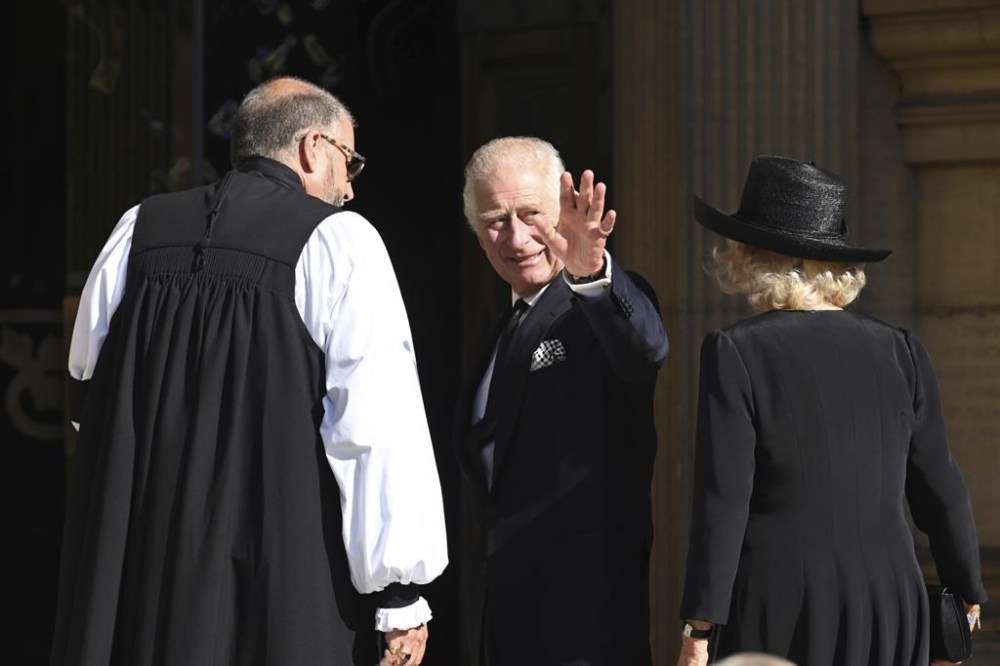 Britain's King Charles III and Camilla, the Queen Consort, arrive at St. Anne's Cathedral to attend a Service of Reflection for the life of Her Majesty The Queen Elizabeth in Belfast, Tuesday, Sept. 13, 2022. King Charles III and Camilla, the Queen Consort, flew to Belfast from Edinburgh on Tuesday, the same day the queen’s coffin will be flown to London from Scotland. (AP Photo/Gregorio Borgia)
