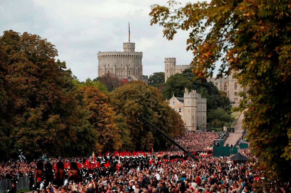 The funeral procession for Britain's Queen Elizabeth II makes its way to Windsor Castle in Windsor, England, Monday, Sept. 19, 2022. (Lee Smith/Pool Photo via AP)