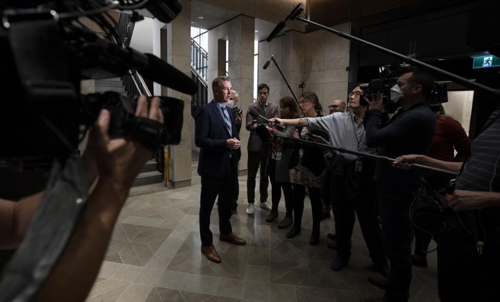 Conservative MP for Leeds-Grenville-Thousand Islands and Rideau Lakes Michael Barrett speaks with media before attending caucus, in Ottawa, Wednesday, Sept. 21, 2022. The federal Conservatives, in one of its first moves under Pierre Poilievre's leadership, are opening the door to supporting part of the Liberal government's affordability plan. THE CANADIAN PRESS/Adrian Wyld