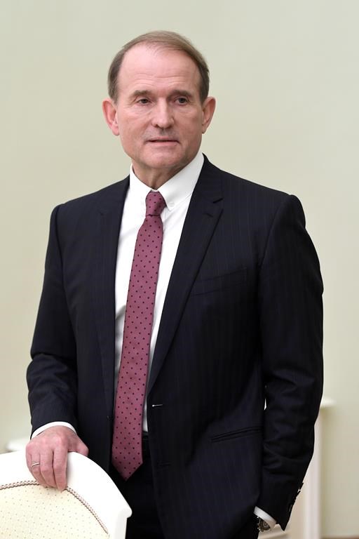 FILE - Chairman of Ukraine’s pro-Russian Opposition Platform-For Life party Viktor Medvedchuk stands as he waits to meet Russian President Vladimir Putin in the Kremlin in Moscow, Russia, Tuesday, March 10, 2020. Ukraine announced a high-profile prisoner swap early Thursday, Sept. 22, 2022 that was the culmination of months of efforts to free many of the Ukrainian fighters who defended a steel plant in Mariupol during a long Russian siege. In exchange, Ukraine gave up Medvedchuk, a prominent ally of Russian President Vladimir Putin and 55 other prisoners. (Alexei Nikolsky, Sputnik, Kremlin Pool Photo via AP, File)