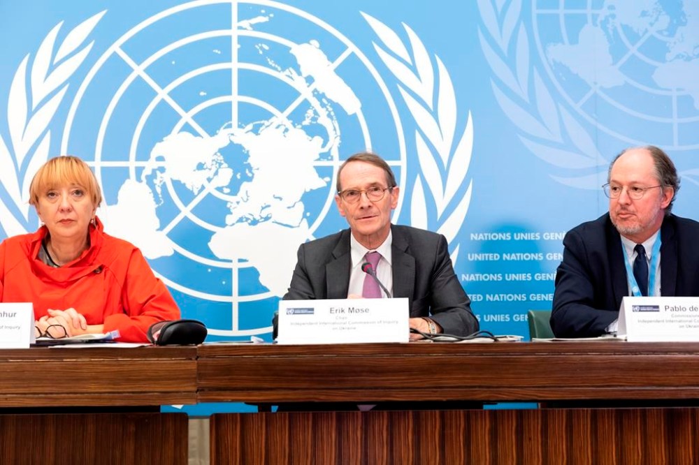 Erik Mose, center, Chair of the Commission of Inquiry on Ukraine, Jasminka Dzumhur, left, and Pablo de Greiff, right, Commissioners of Inquiry on Ukraine, talk to the media during a press conference following an update to the UN Human Rights Council, at the European headquarters of the United Nations in Geneva, Switzerland, Friday, Sept. 23, 2022. A team of experts commissioned by the U.N.’s top human rights body to look into rights violations in Ukraine said Friday its initial investigation turned up evidence of war crimes in the country following Russia’s invasion nearly seven months ago. (Salvatore Di Nolfi/Keystone via AP)