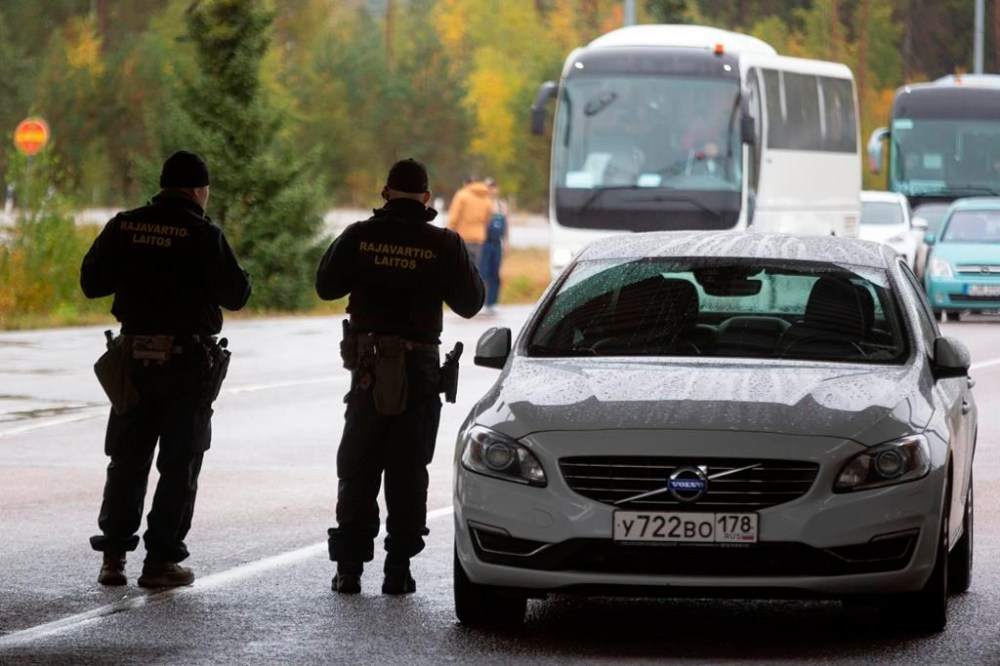 Finnish border guards on patrol, at the Vaalimaa border check point between Finland and Russia in Virolahti, Finland, Friday, Sept. 30, 2022. The Finnish-Russia border was closed Friday after the Nordic country announced it would ban Russians with tourist visas from entering, curtailing one of the last easily accessible routes to Europe for Russians trying to flee a military mobilization. Long queues were reported until midnight and among the last to enter Finland were two cyclists who arrived a little before 11 p.m., Finnish broadcaster YLE reported. (Sasu Makinen./Lehtikuva via AP)