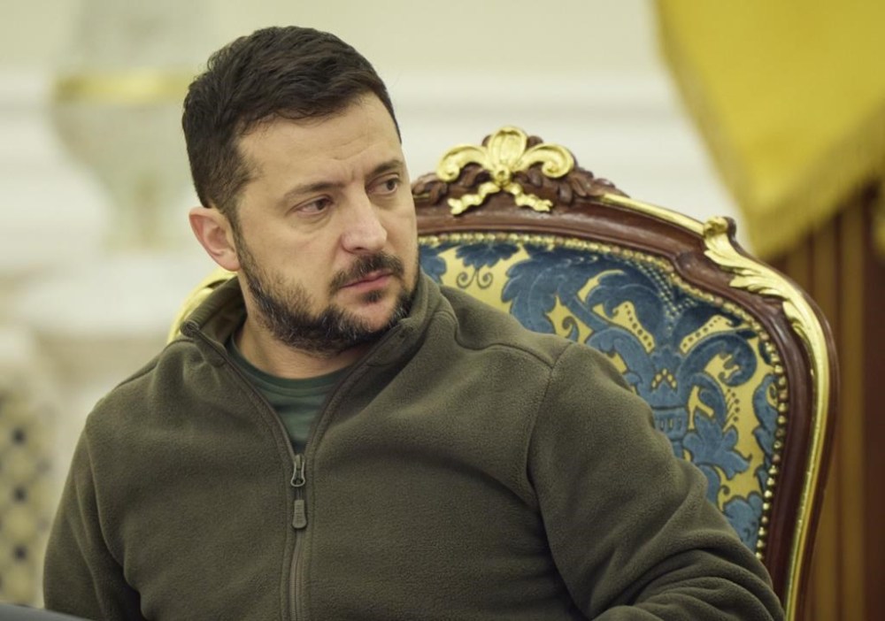 In this photo released by Ukrainian Presidential Press Office, Ukrainian President Volodymyr Zelenskyy leads a meeting of the National Security and Defense Council in Kyiv, Ukraine, Friday, Sept. 30, 2022. Ukraine's president says his country is submitting an