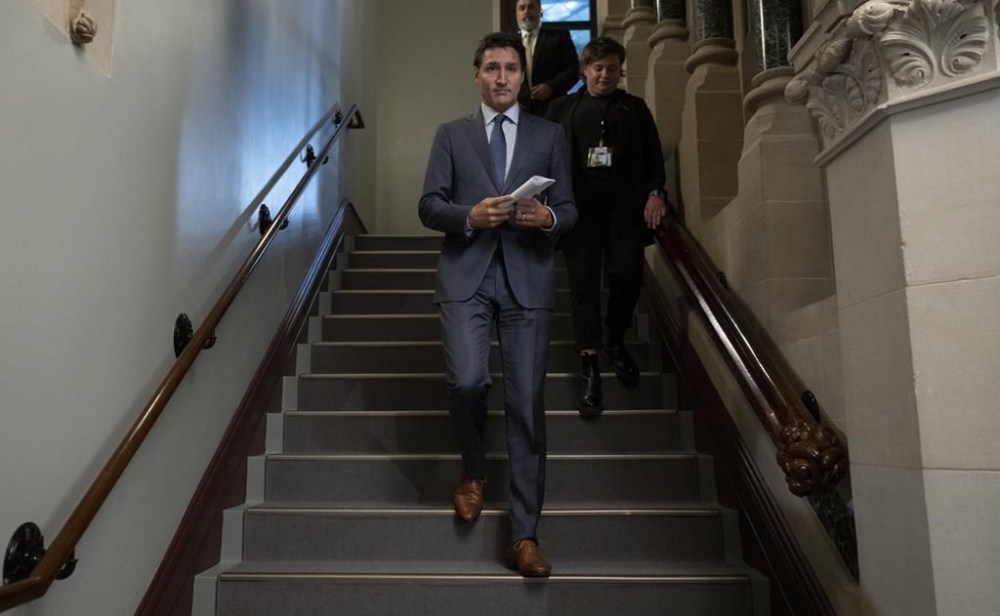 Prime Minister Justin Trudeau makes his way to caucus on Parliament Hill on Wednesday, October 5, 2022 in Ottawa. Trudeau says it is clear that Hockey Canada executives just don't get the seriousness of the situation the organization is facing. THE CANADIAN PRESS/Adrian Wyld