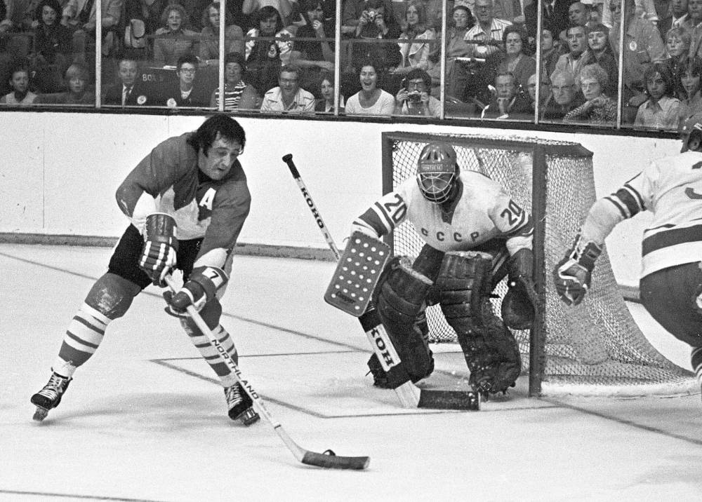 PETER BREGG / THE CANADIAN PRESS FILES
Phil Esposito tries a backhand shot against USSR’s Tretiak in Toronto. Canada won the game 4-1.
