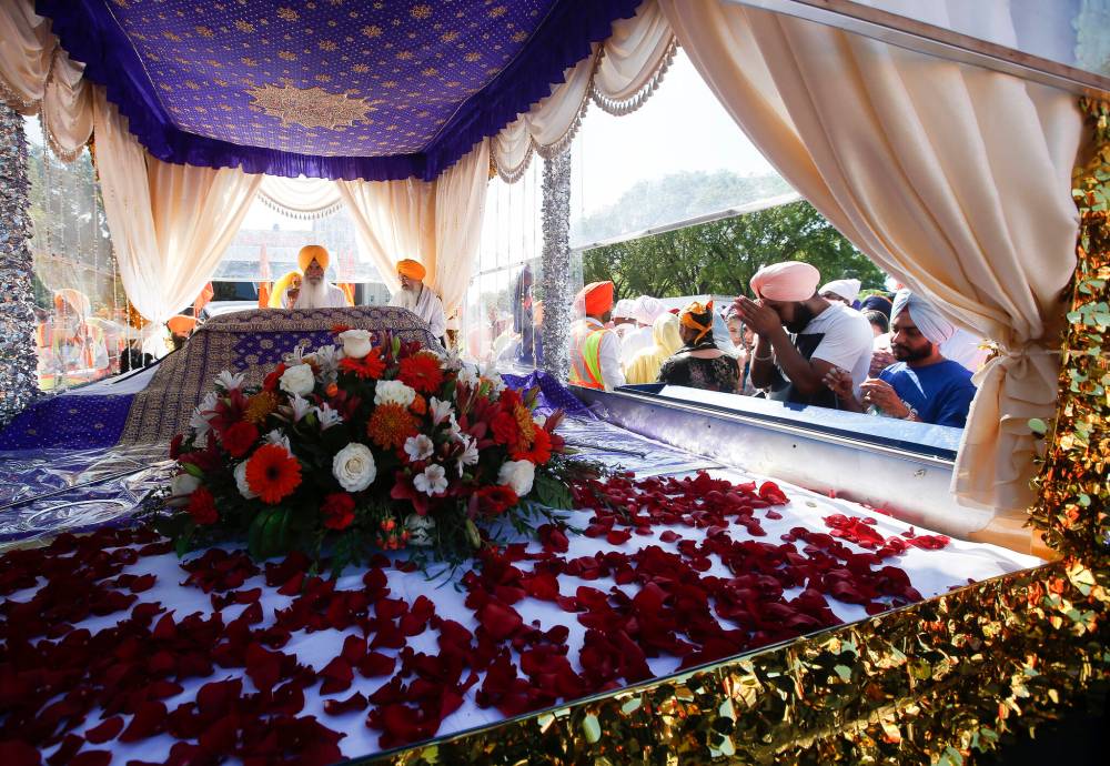 JOHN WOODS / WINNIPEG FREE PRESS
The kirtan — hymns from the holy scripture — were played over speakers from a parade float.