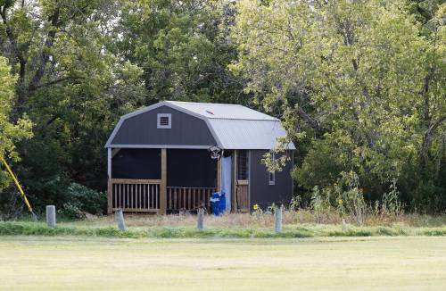 JOHN WOODS / WINNIPEG FREE PRESS A tiny home has been placed on a piece of city property near St James Memorial Sports Park by someone locals say is homeless.