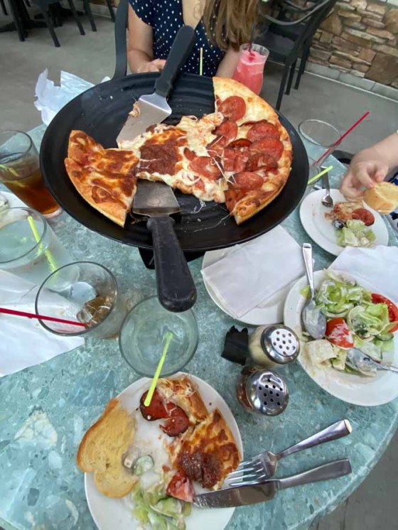 This abomination of a food photo was my attempt to capture the thick, almost-burnt cheese that adorns Houston Pizza’s glorious pies. (Ben Sigurdson / Winnipeg Free Press)