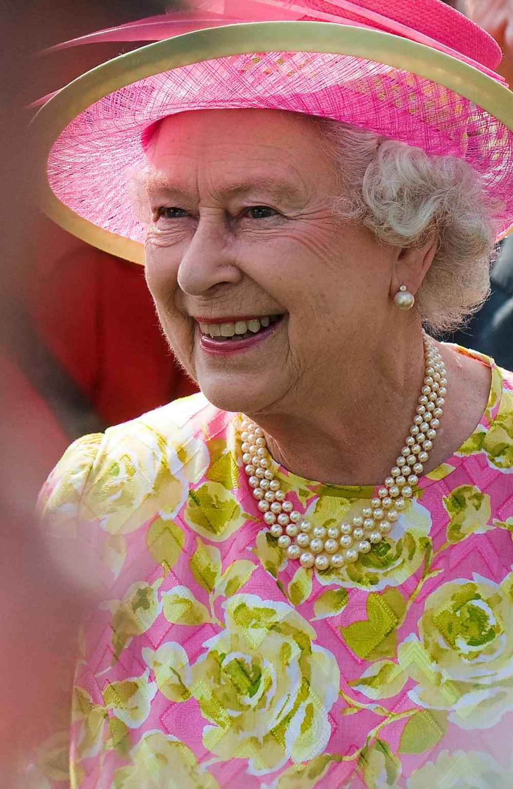 Queen Elizabeth II smiles as she walks around at Government House on July 3, 2010. (David Lipnowski / Winnipeg Free Press files)