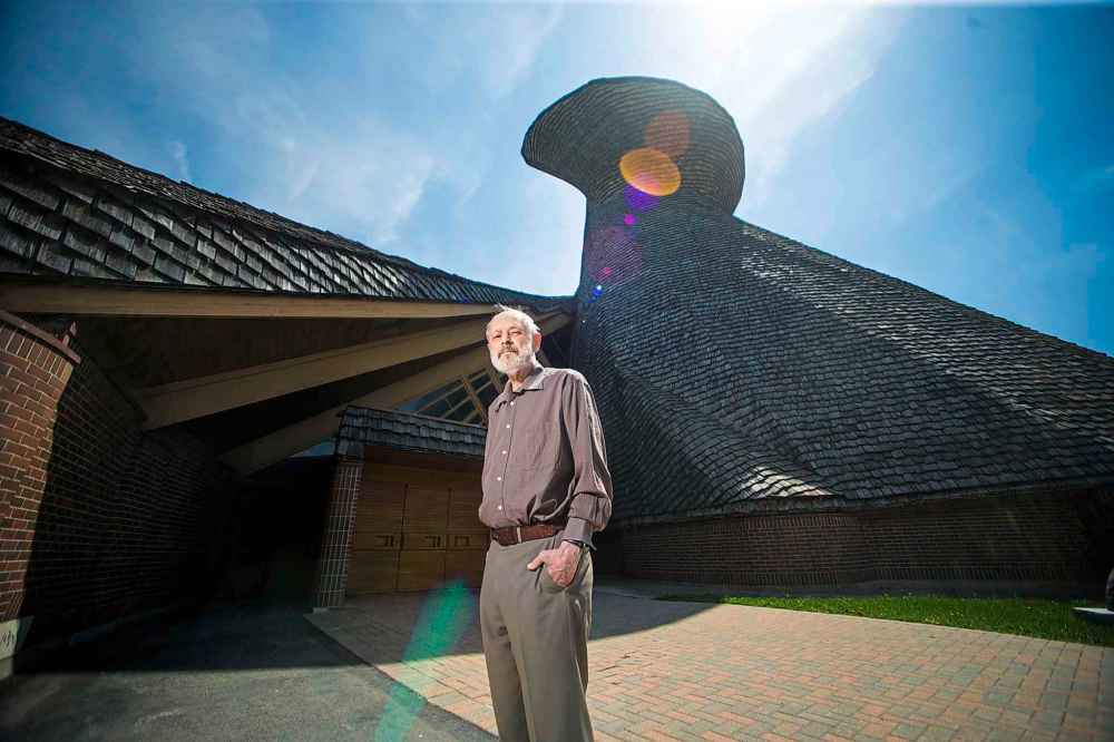 Architect Étienne Gaboury poses in front of Precious Blood Roman Catholic Church. (Mikaela MacKenzie / Winnipeg Free Press files)