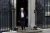 Britain's Prime Minister Liz Truss leaves 10 Downing Street to attend the weekly Prime Ministers' Questions session in parliament in London, Wednesday, Oct. 19, 2022. (AP Photo/Kin Cheung)