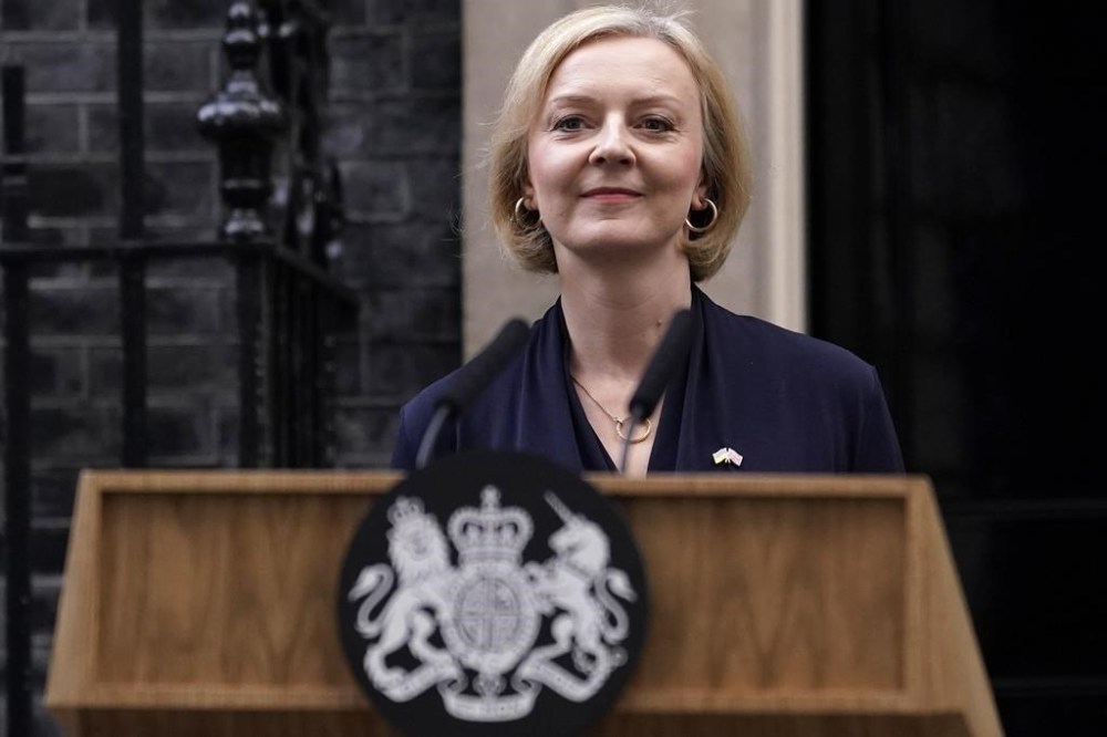 Britain's Prime Minister Liz Truss addresses the media in Downing Street in London, Thursday, Oct. 20, 2022. Truss says she resigns as leader of UK Conservative Party. (AP Photo/Alberto Pezzali)
