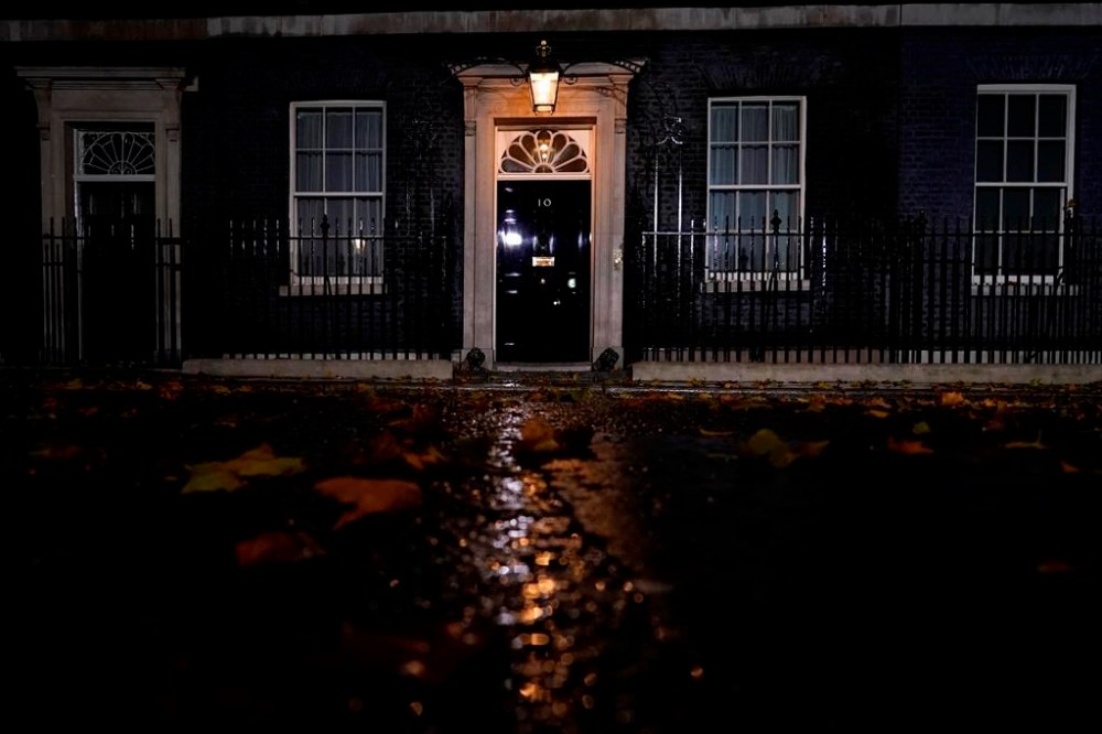 A general view of 10 Downing Street, in London, Sunday, Oct. 23, 2022. Former British Treasury chief Rishi Sunak is frontrunner in the Conservative Party's race to replace Liz Truss as prime minister. He has garnered support from over 100 Tory lawmakers to forge ahead of his two main rivals: ousted former Prime Minister Boris Johnson and ex-Cabinet minister Penny Mordaunt. But widespread uncertainty remained after British media reported that Sunak held late-night talks with Johnson on Saturday. (AP Photo/Alberto Pezzali)