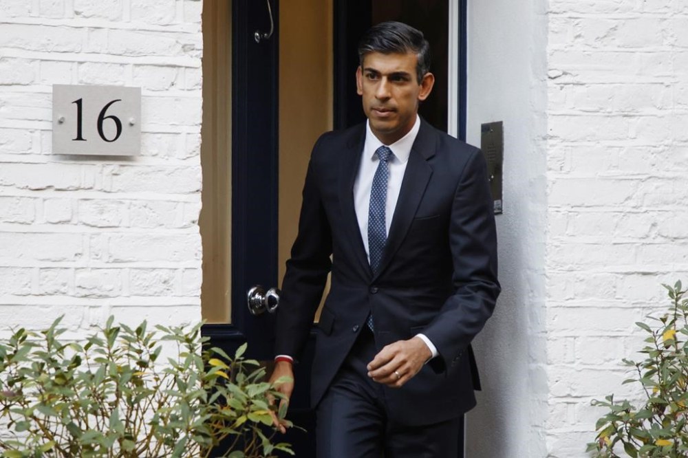 Conservative Party leadership candidate Rishi Sunak leaves his home in London, Monday, Oct. 24, 2022. Former British Treasury chief Rishi Sunak is frontrunner in the Conservative Party's race to replace Liz Truss as prime minister. (AP Photo/David Cliff)