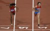 FILE - Russia's Natalya Antyukh, right, powers ahead of United States' Lashinda Demus to win gold in the women's 400-meter hurdles final during the athletics in the Olympic Stadium at the 2012 Summer Olympics, London, Wednesday, Aug. 8, 2012. Russian runner Natalya Antyukh was disqualified on Monday, Oct. 24, 2022 from her 400-meter hurdles win at the 2012 London Olympics for doping, and Lashinda Demus of the United States is set to be upgraded to the gold medal. (AP Photo/Daniel Ochoa De Olza, File)