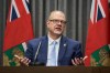 Then Premier Kelvin Goertzen speaks to the media at the Legislative Building in Winnipeg on Wednesday Sept.1, 2021.The Manitoba government is putting up $3.6 million to improve safety in downtown Winnipeg and addressing homelessness and addiction. THE CANADIAN PRESS/David Lipnowski