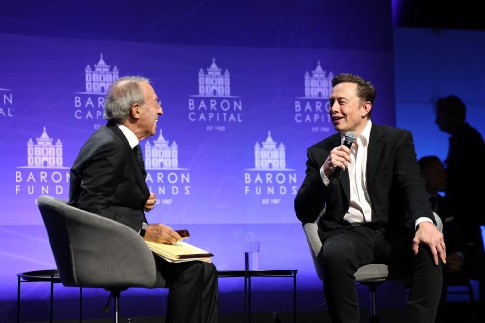 Baron Capital Group Chairman and CEO Ron Baron interviews Tesla CEO Elon Musk at the 29th Annual Baron Investment Conference in New York City on Friday, Nov. 4, 2022. ( Baron Capital via AP)