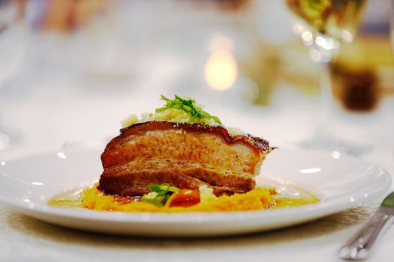 Filipino pork belly adobo with candied sweet potatoes, mustard pickles and skillet cornbread from chef Paul Ormond. (Mikaela MacKenzie / Winnipeg Free Press)