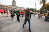 A protestor yells and walks away after she was allowed to collect her confiscated pole. (John Woods / Winnipeg Free Press)