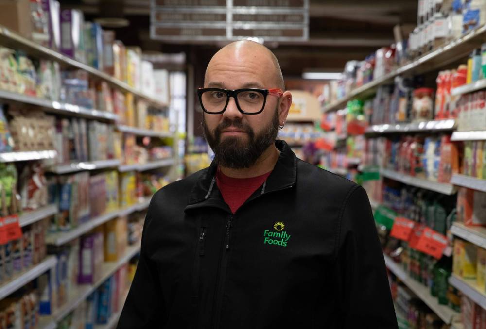 Kevin Schmidt, co-owner of Downtown Family Foods, said he can't freeze prices since he gets much of his stock from Sobeys. (Jessica Lee / Winnipeg Free Press)