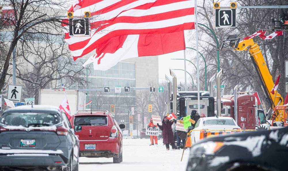 Mike Sudoma / Winnipeg Free Press Files
On Feb. 10, dozens of protesters in semi-trucks, farm tractors and snowplows set up barricades in Emerson, bringing cross-border traffic in both directions to a halt for several days.